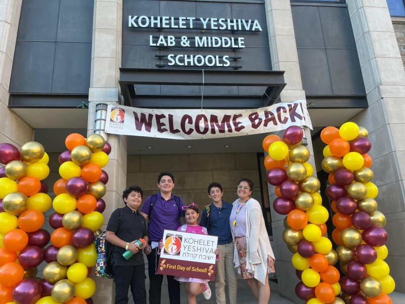Welcome back banner with students