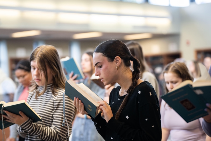 Girls studying books together