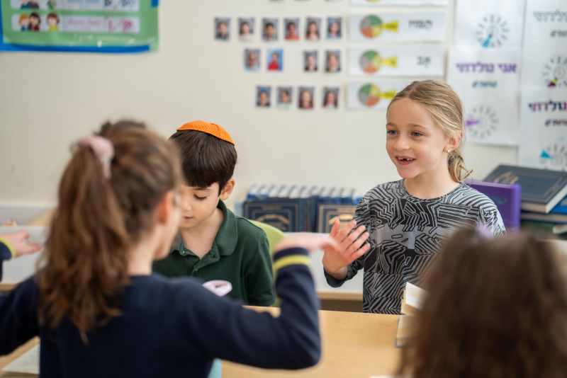 Children interacting in classroom circle